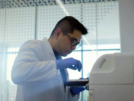 man doing genetics research in a lab